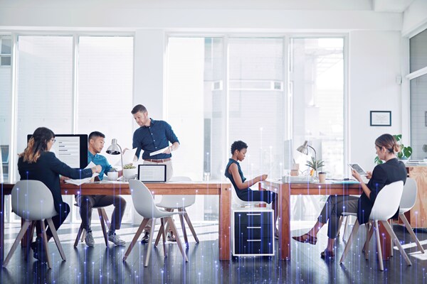 Employee reviewing desk booking data to support informed workplace decisions.