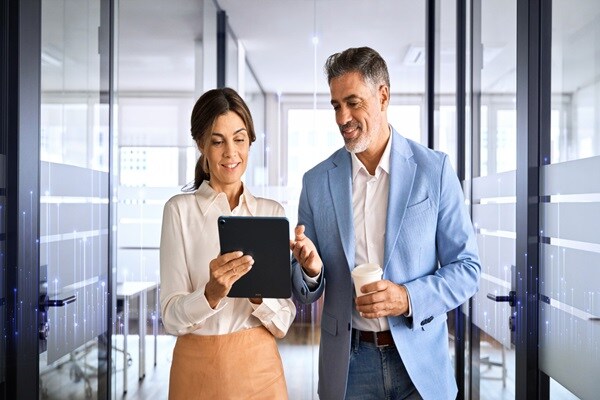Professional using analytics insights to assess workplace performance and efficiency.