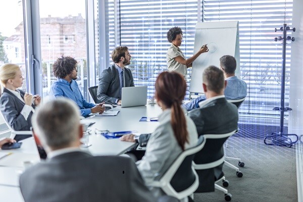 Professional using analytics insights to assess workplace performance and efficiency.