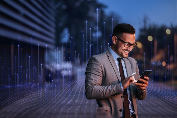 A man looking into phone